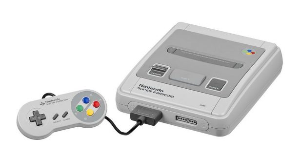 Une console de jeu Nintendo super famicom